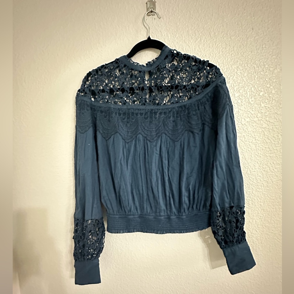 Navy Blue Free People embroidered blouse.